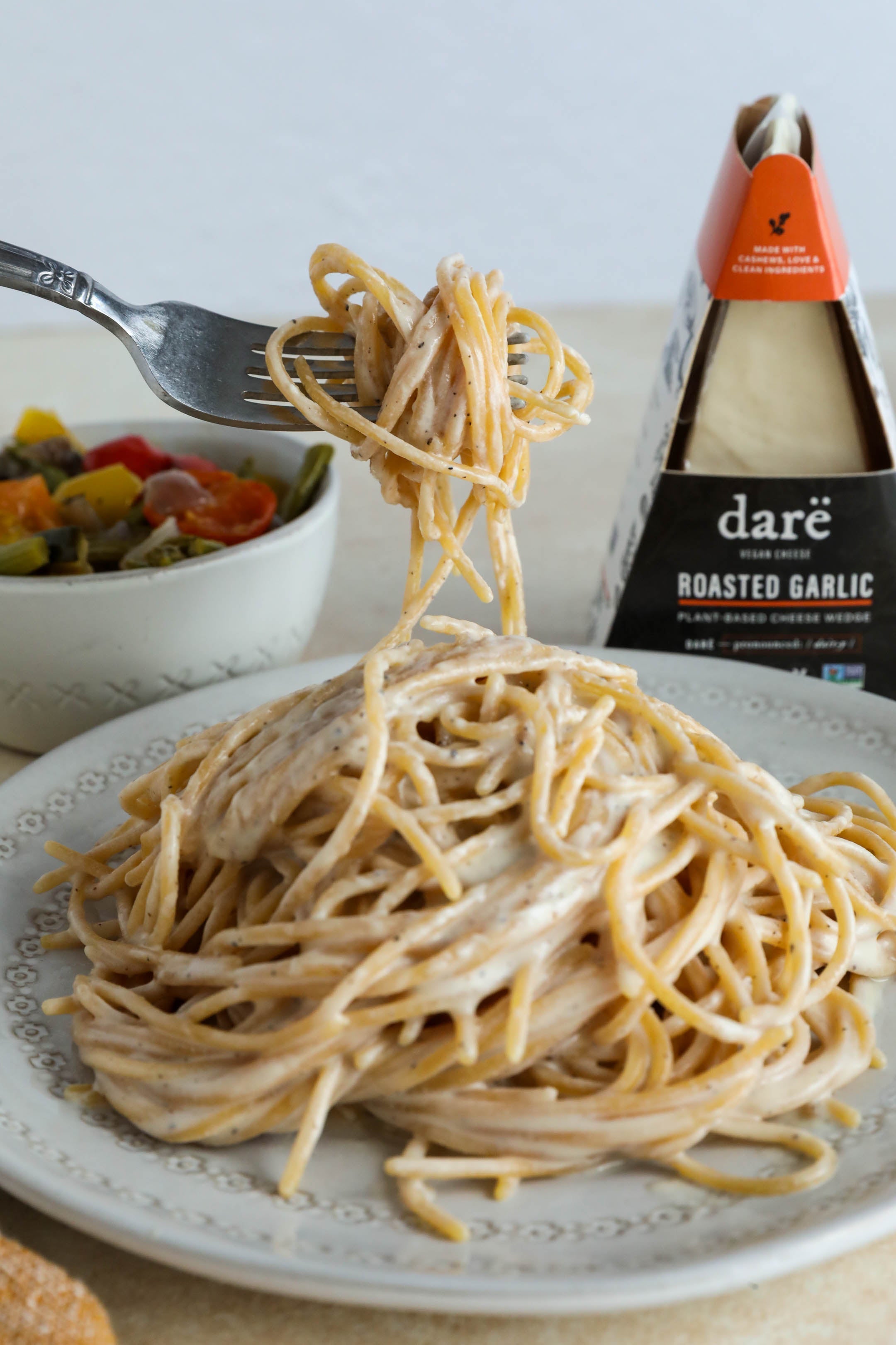 Vegan Cacio e Pepe on a fork