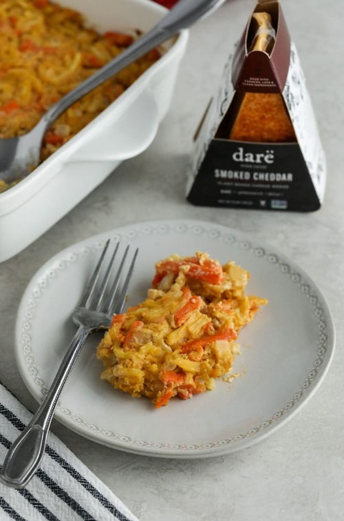 Load image 1 in gallery view. Plate of food with a fork and Dare Smoked Cheddar packaging on a gray surface