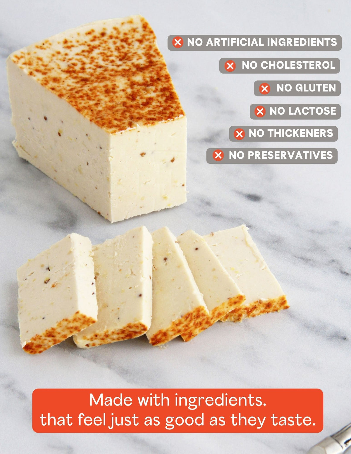 A slice of Darë Vegan Cheese Lusty Mustard plant-based cheese on a light marble surface, sliced into pieces with product attribute copy overlaid.