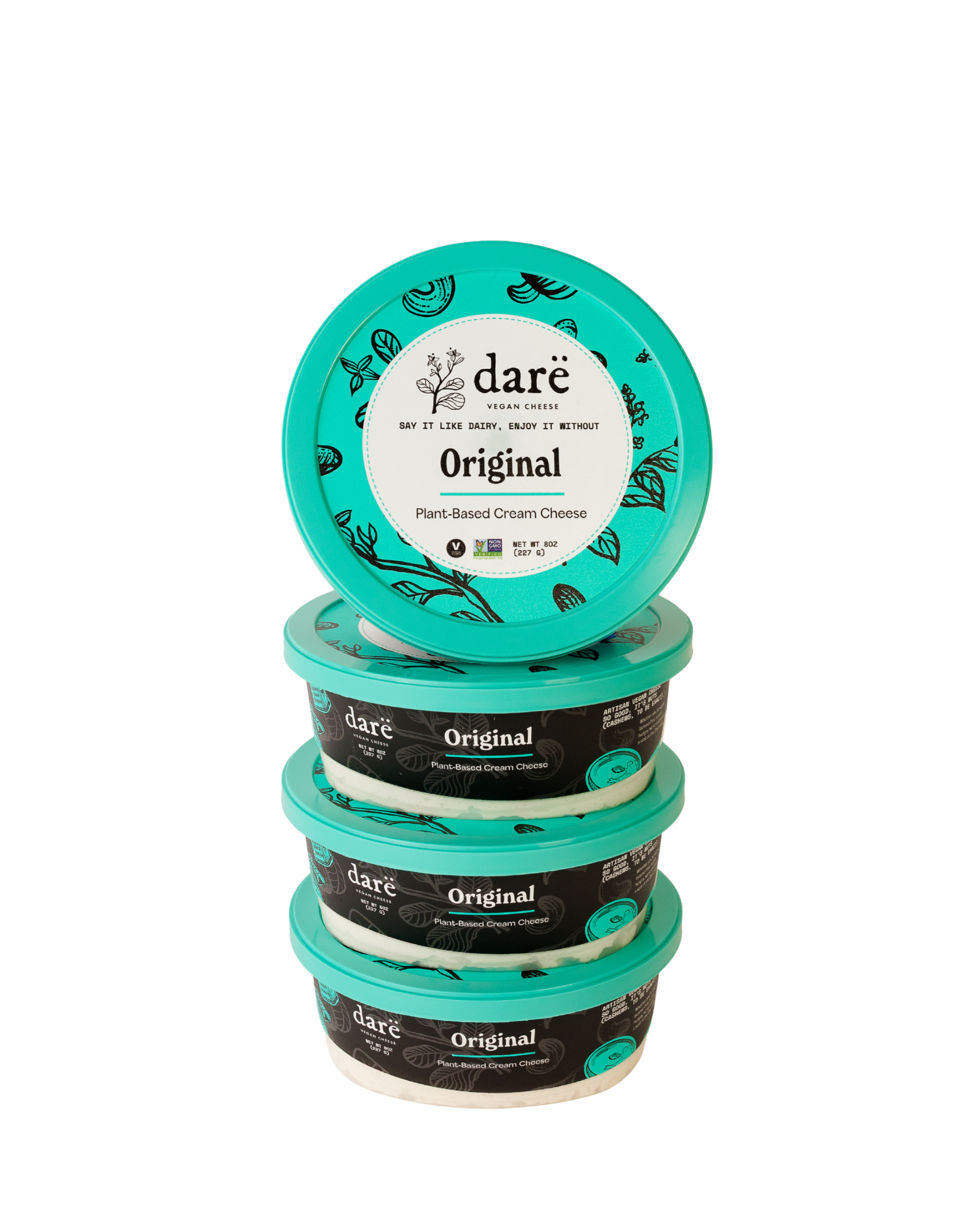 Stack of Dare Original plant-based cream cheese containers on a white background