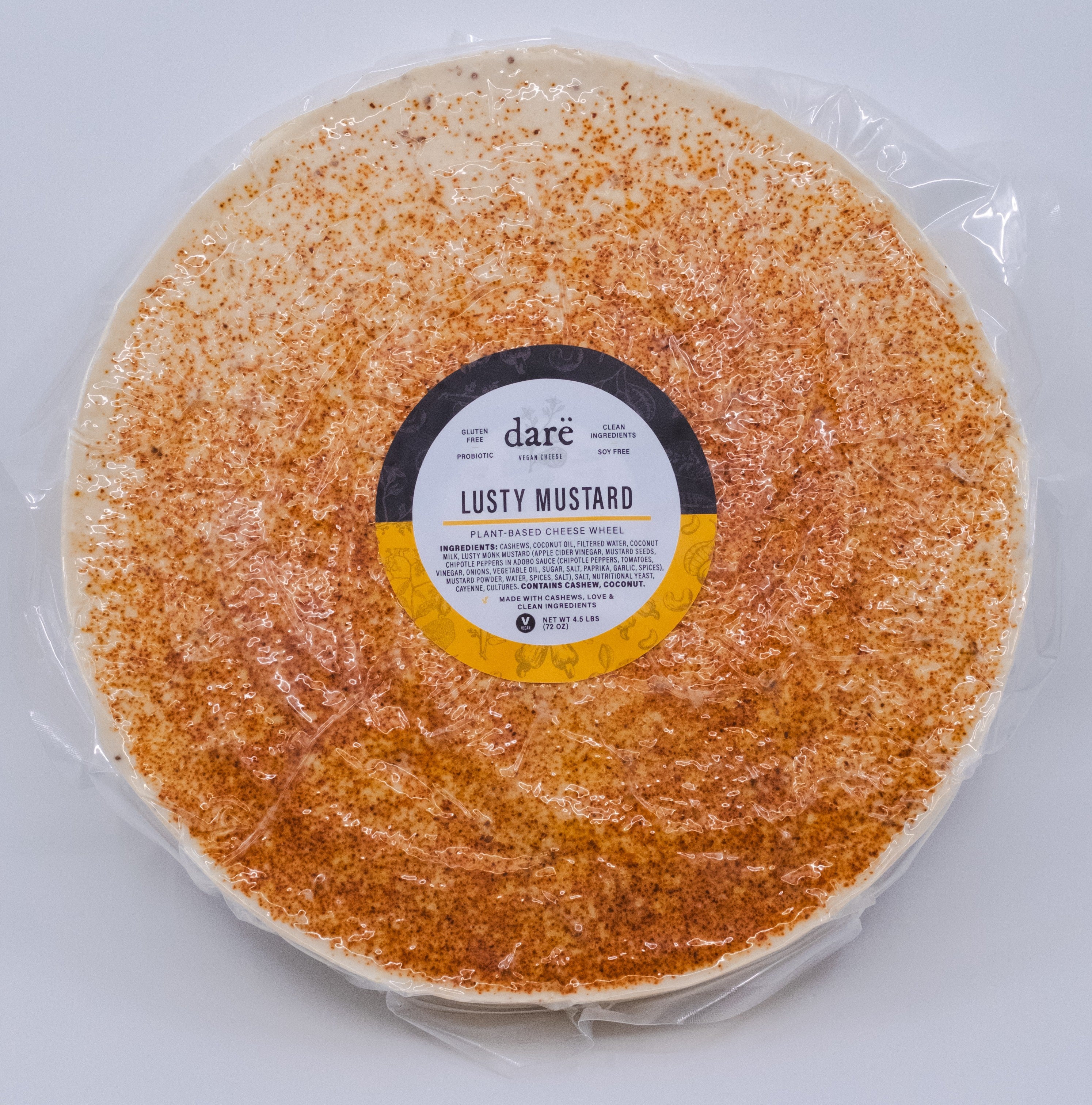Round cheese wheel with 'dare' label on a white background