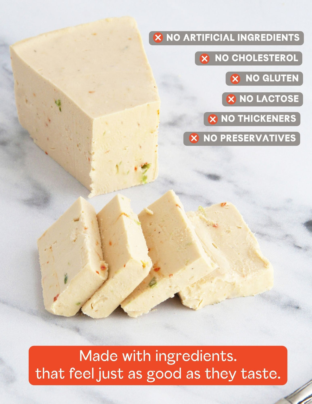 A slice of Darë Vegan Cheese Pepperjack plant-based cheese on a light marble surface, sliced into pieces with product attribute copy overlaid.