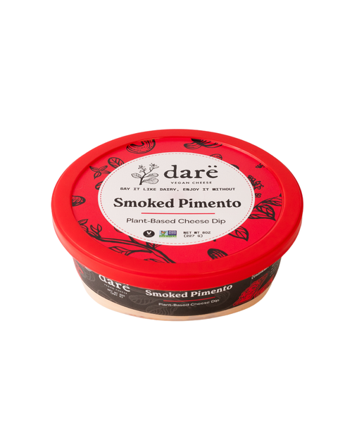 Load image 1 in gallery view. Red container of dare Smoked Pimento plant-based cheese dip on a white background