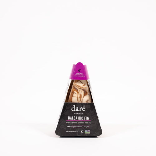 Load image 1 in gallery view. Darë  balsamic fig cheese wedge product photo, in black and purple triangular paper container